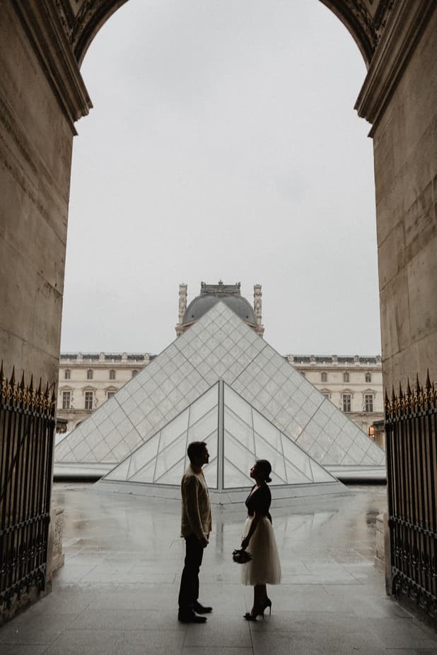 Couple in the rain Louvre Museum Paris Photography