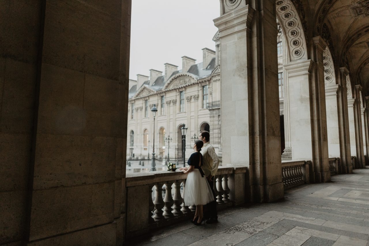 Couple in the rain Louvre Museum Paris Photography