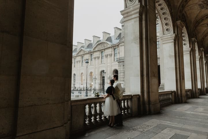 Couple in the rain Louvre Museum Paris Photography
