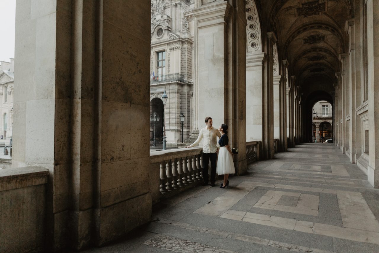 Couple in the rain Louvre Museum Paris Photography