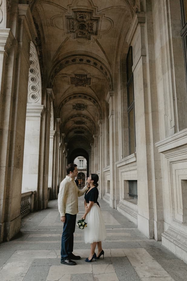 Couple in the rain Louvre Museum Paris Photography