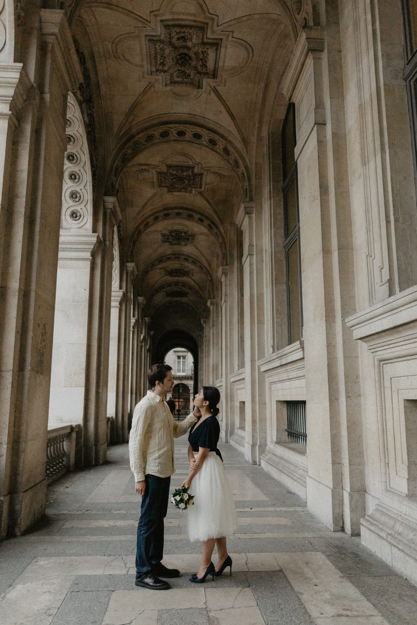 Couple in the rain Louvre Museum Paris Photography