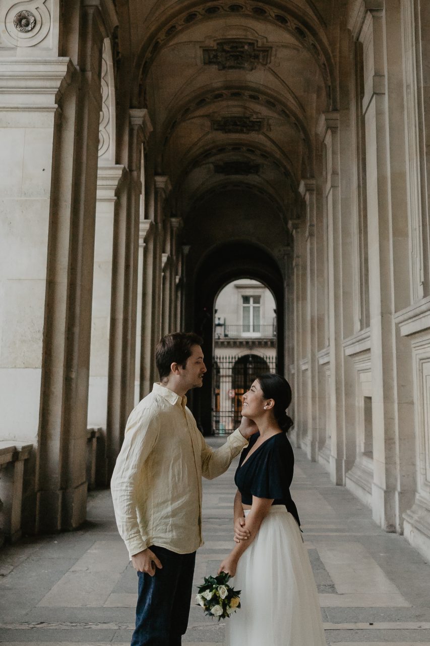 Couple in the rain Louvre Museum Paris Photography