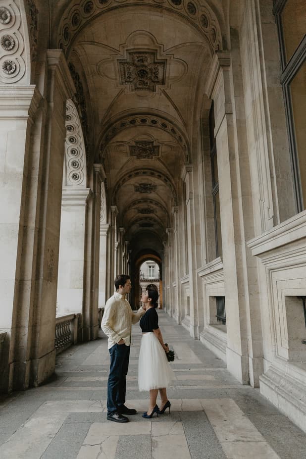 Couple in the rain Louvre Museum Paris Photography