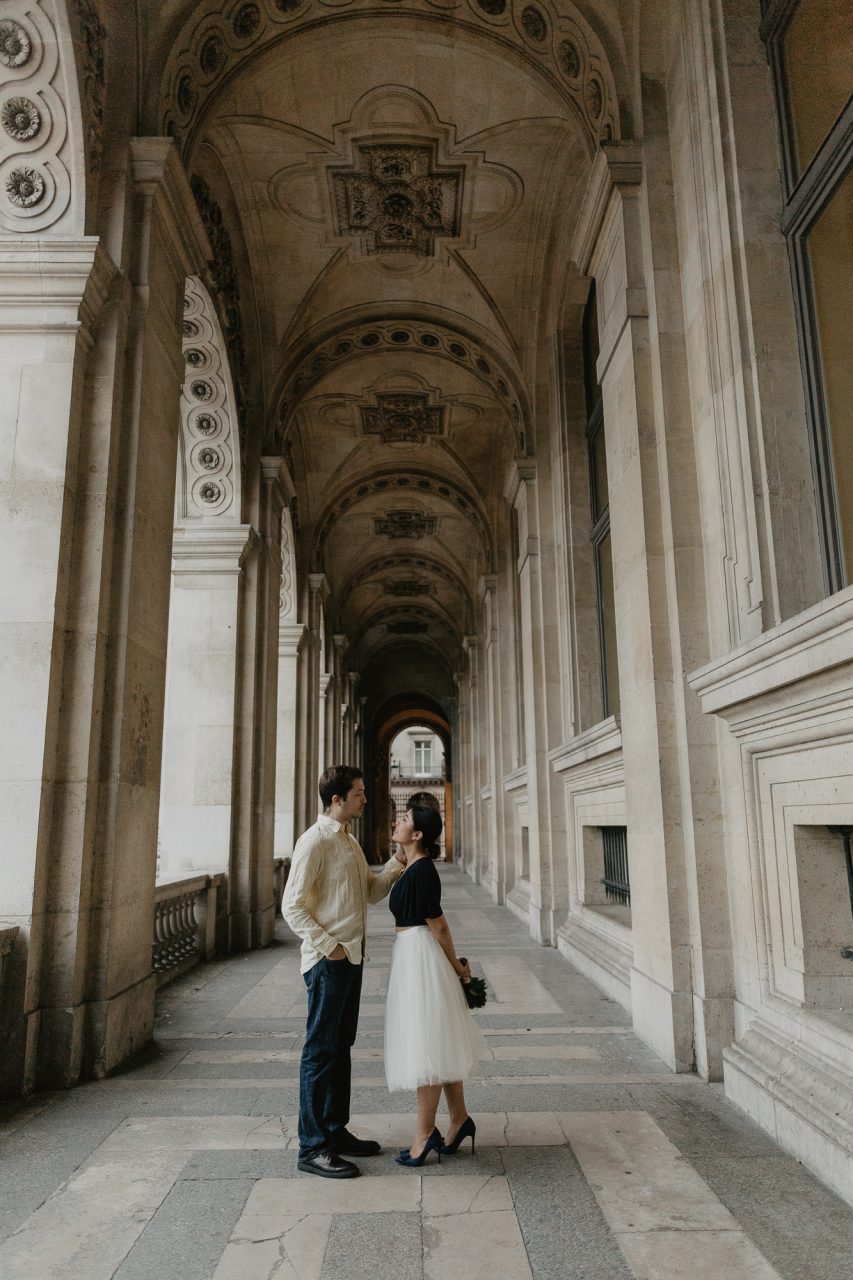 Couple in the rain Louvre Museum Paris Photography