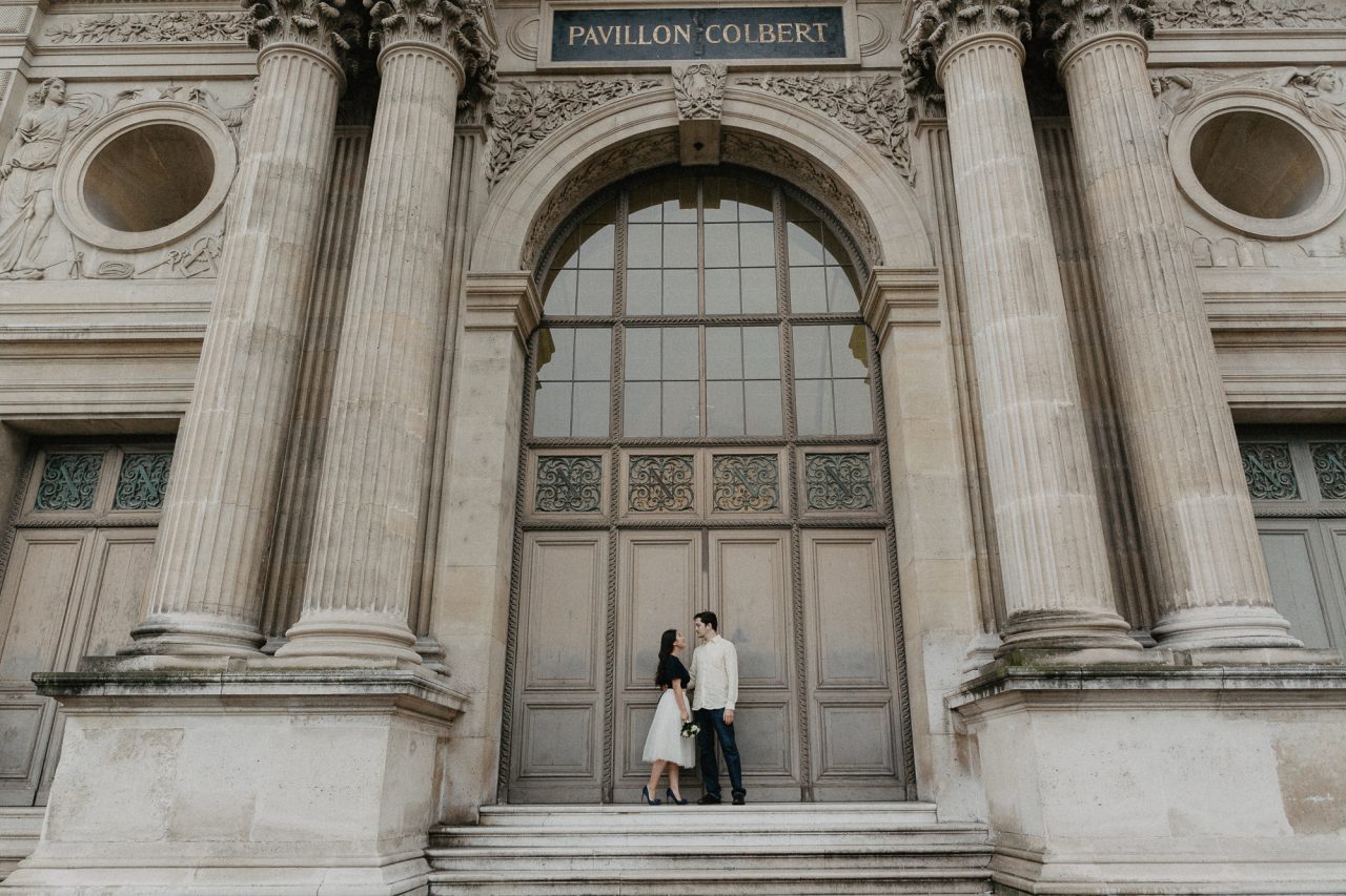 Couple in the rain Louvre Museum Paris Photography