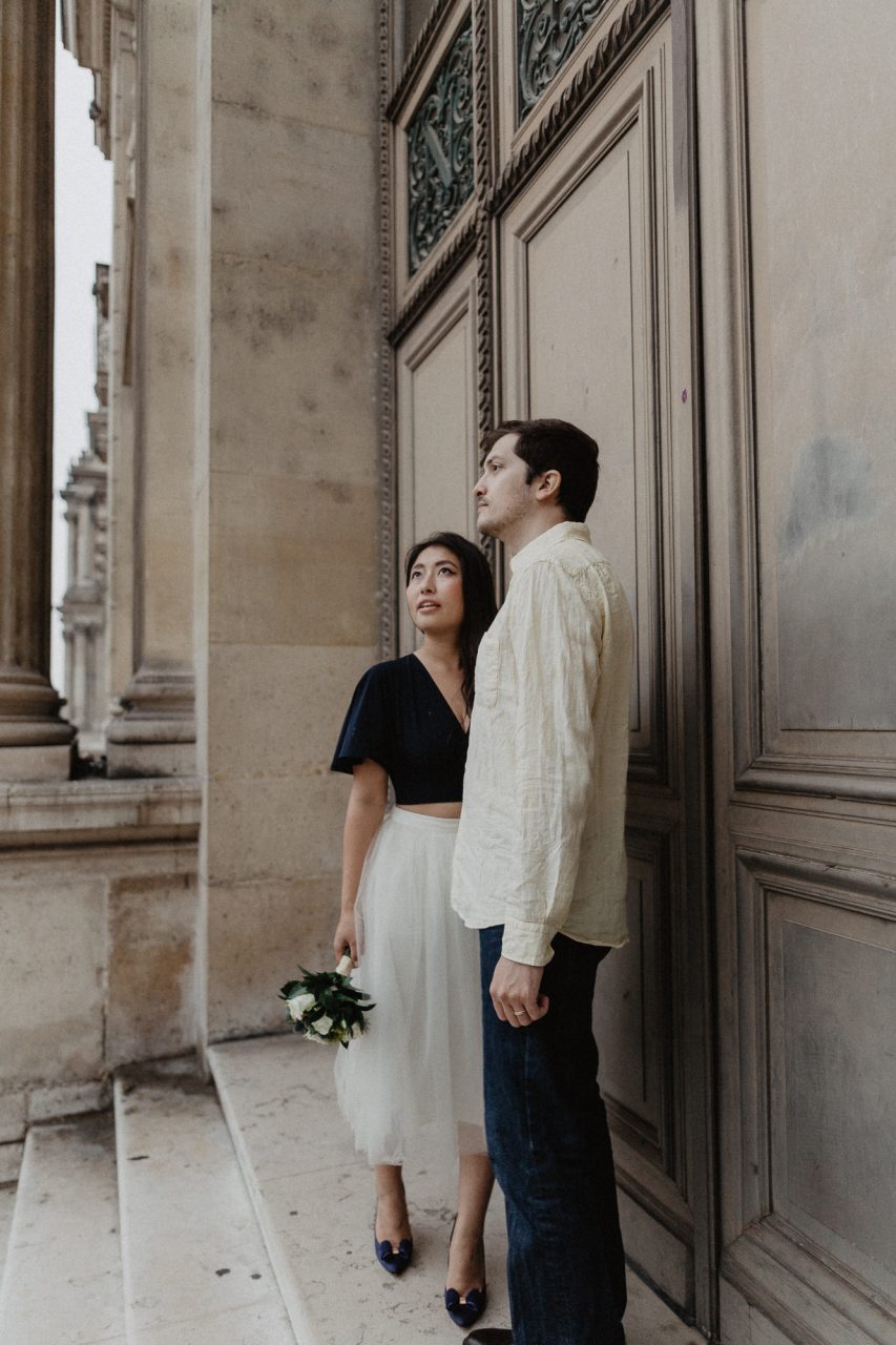 Couple in the rain Louvre Museum Paris Photography