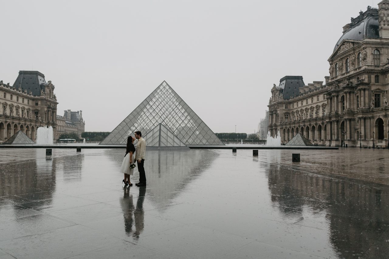 Couple in the rain Pyramid Louvre Museum Paris Photography
