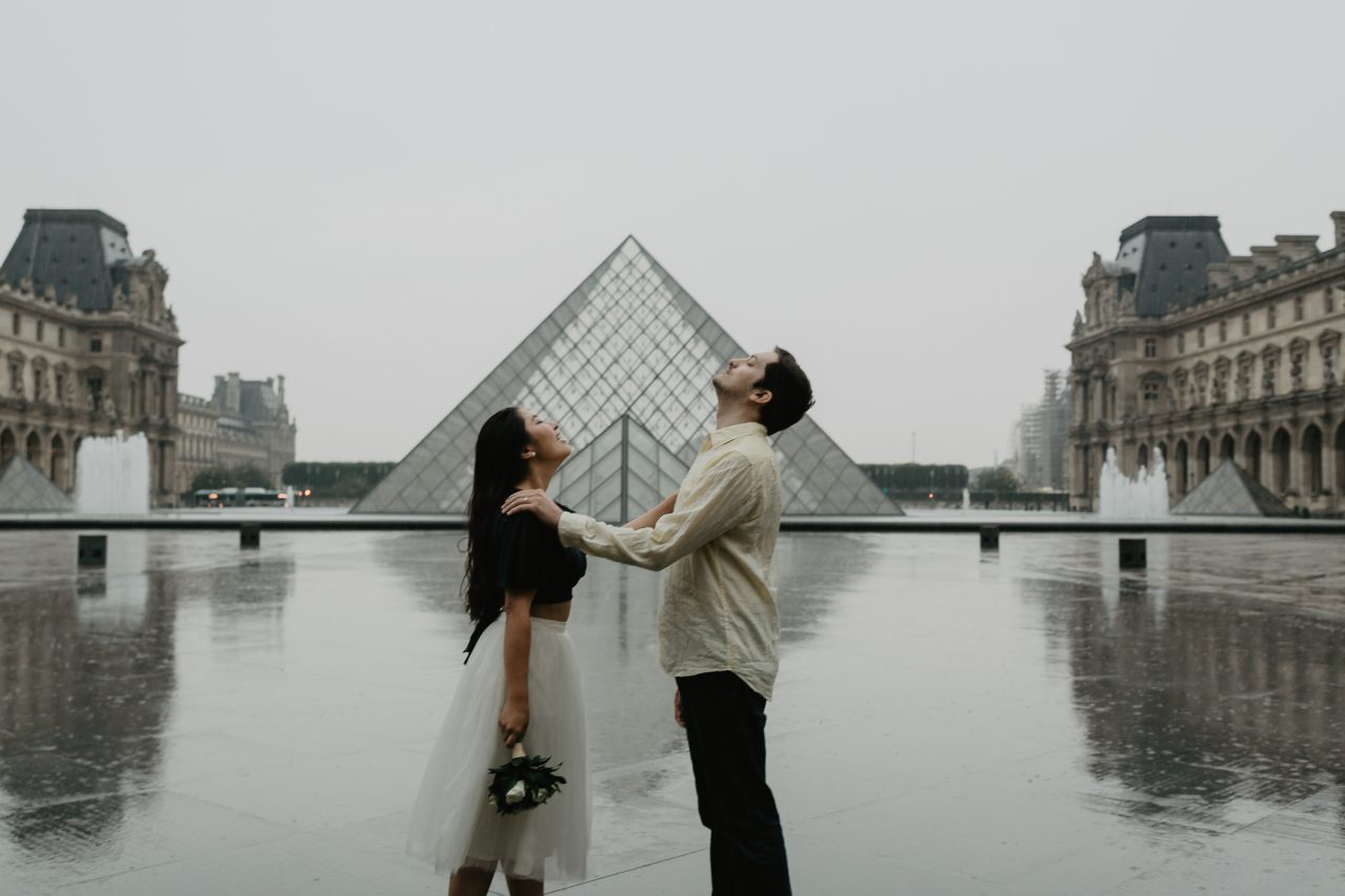 Couple under the rain Pyramid Louvre Museum Paris Photography