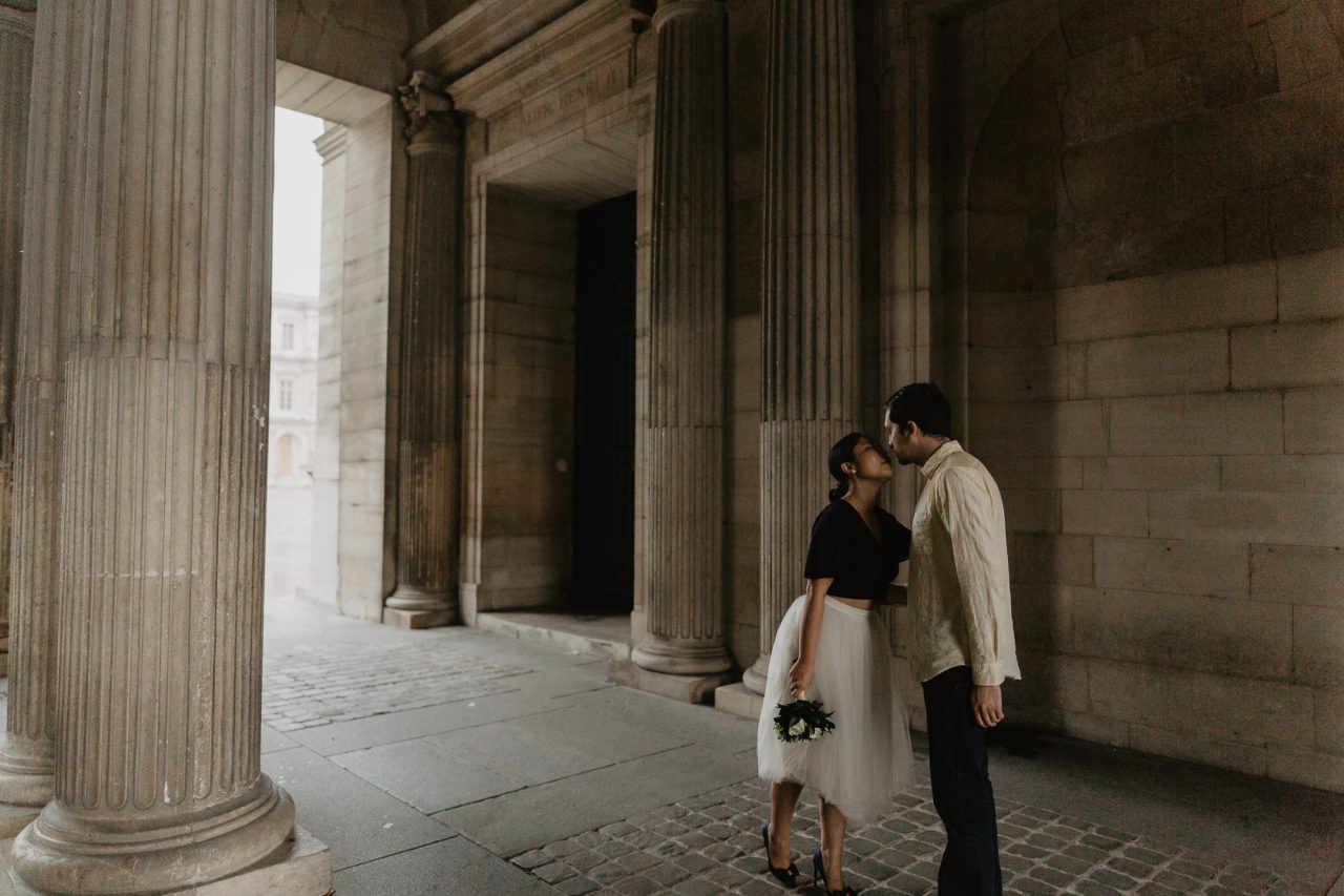 Couple in the rain Louvre Museum Paris Photography