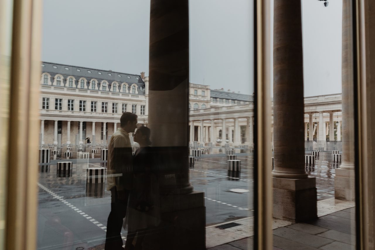Couple reflection Palais Royal Paris