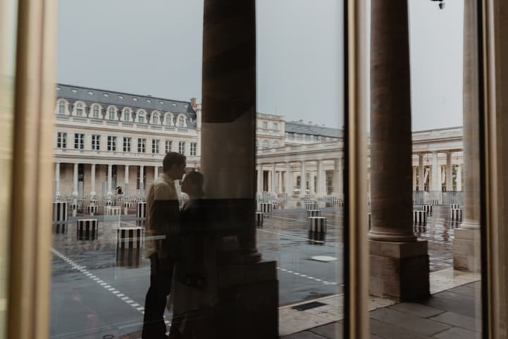 Couple reflection Palais Royal Paris