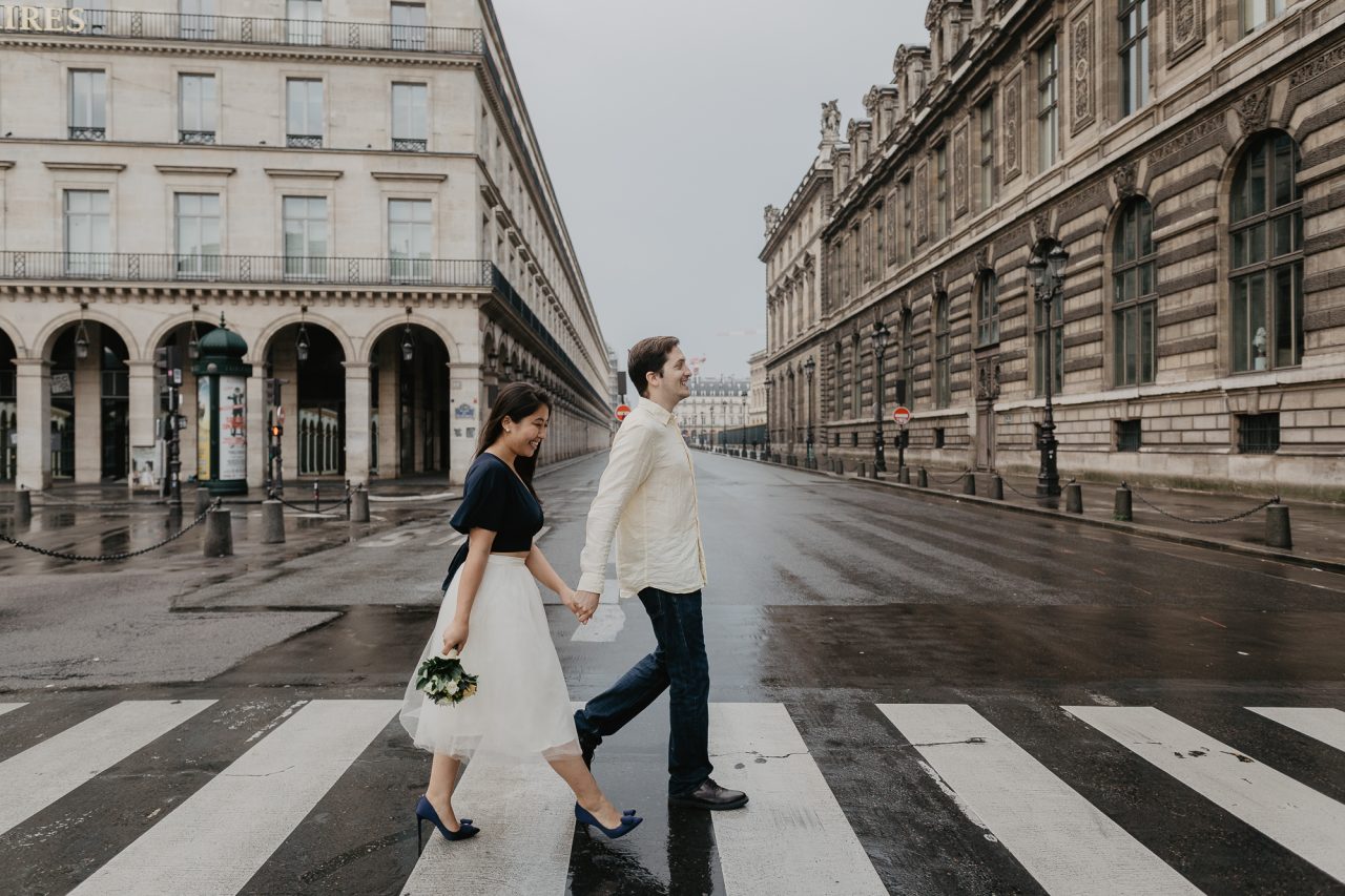 Crossing the street Louvre Paris