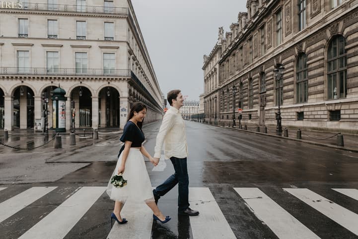 Crossing the street Louvre Paris