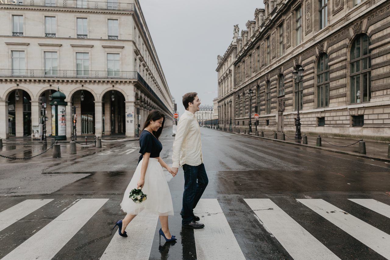 Crossing the street Louvre Paris