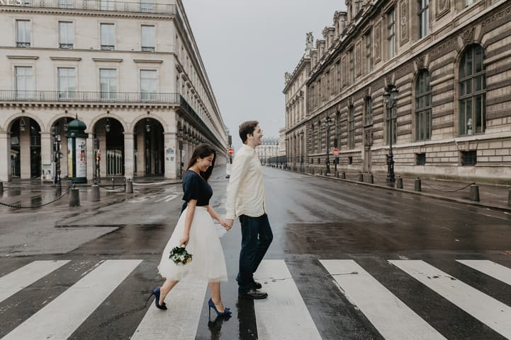 Crossing the street Louvre Paris
