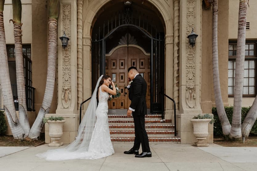 wedding first look couple cry