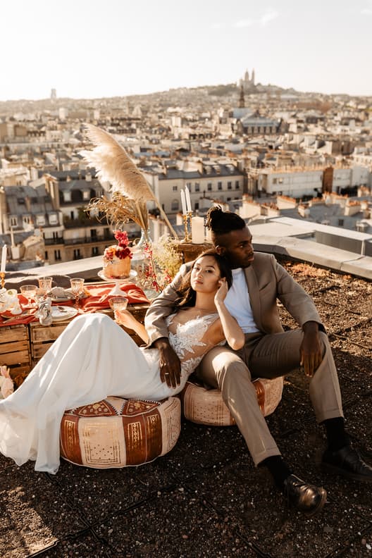 elopement celebration paris rooftop with mixed couple