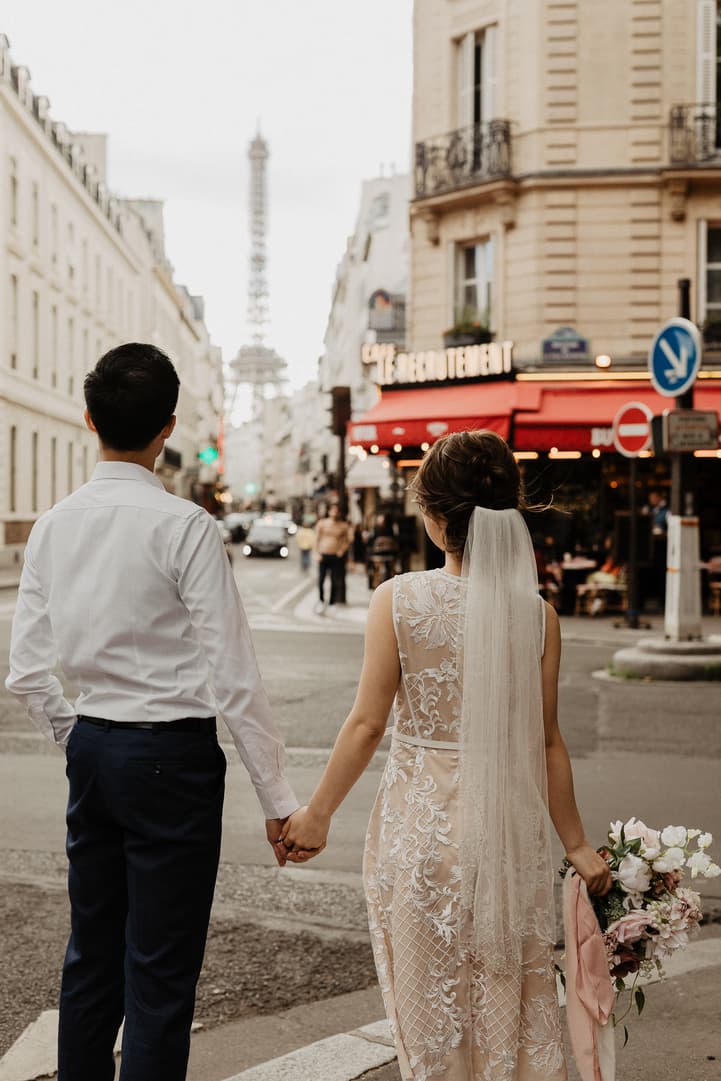 Bride and groom on Eiffel tower street