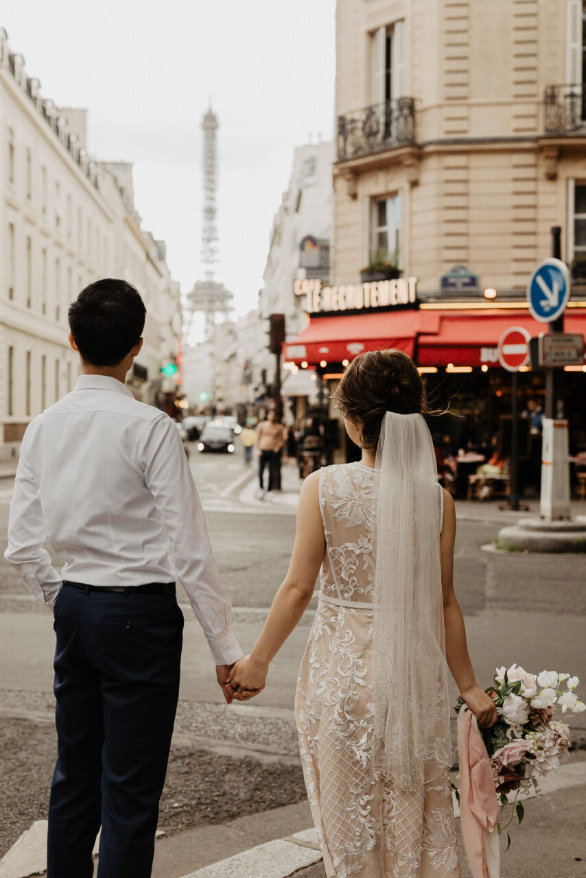 Bride and groom on Eiffel tower street