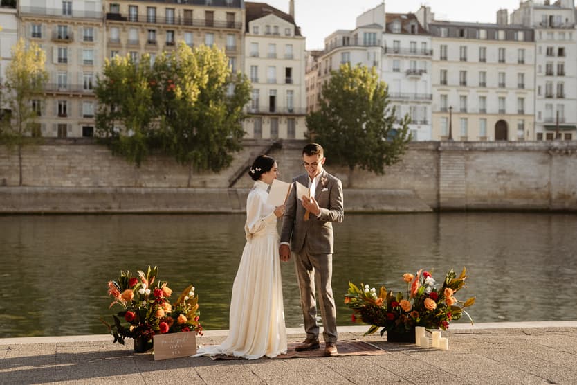 Couple exchange vows in Paris elopement seine river
