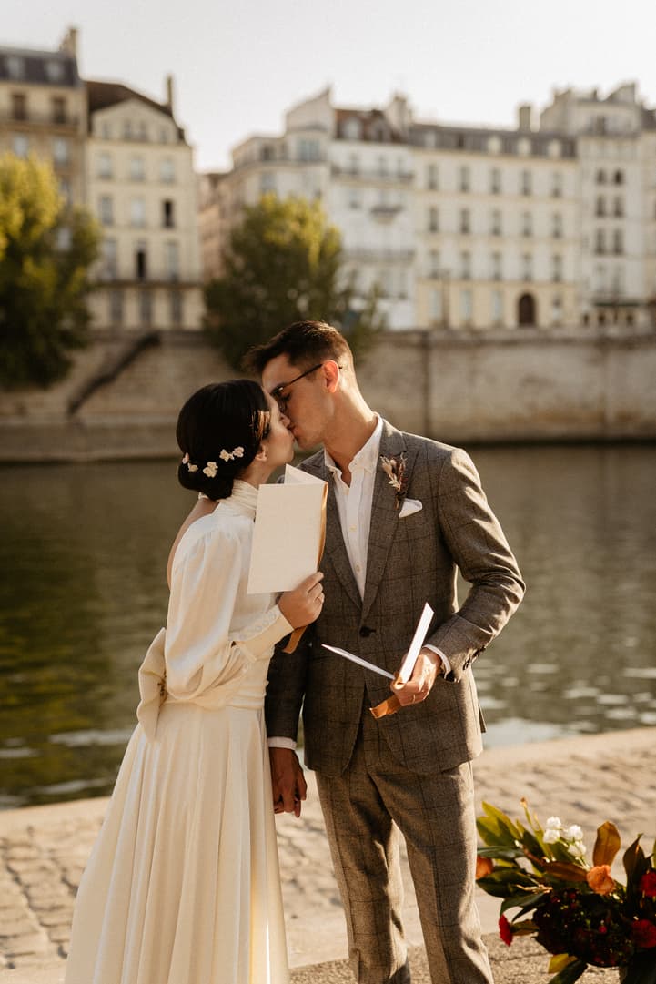 Bride and groom kissing paris elopement