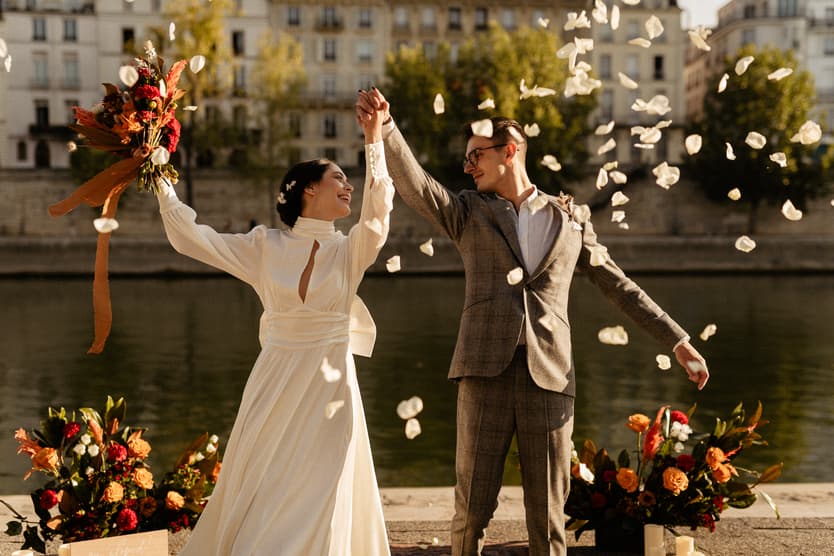 Paris elopement wedding exit with flower petals