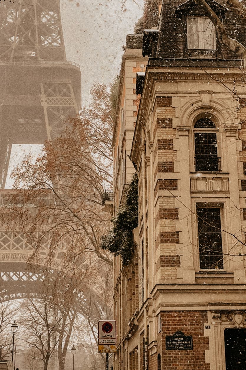 Eiffel tower under the snow paris haussmanian building france