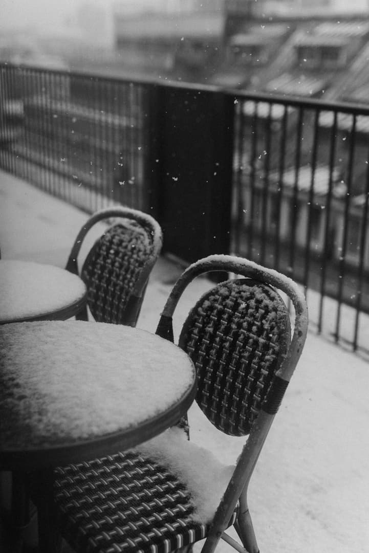 Snow in paris winter cafe