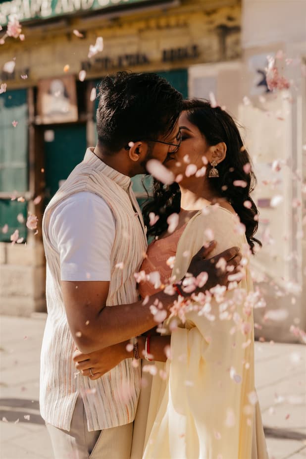 Couple elopement at Shakespeare book store under cherry blossoms