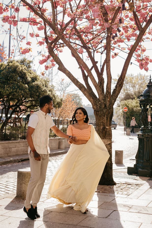 Cherry blossoms spring couple elopement wedding Paris street photoshoot