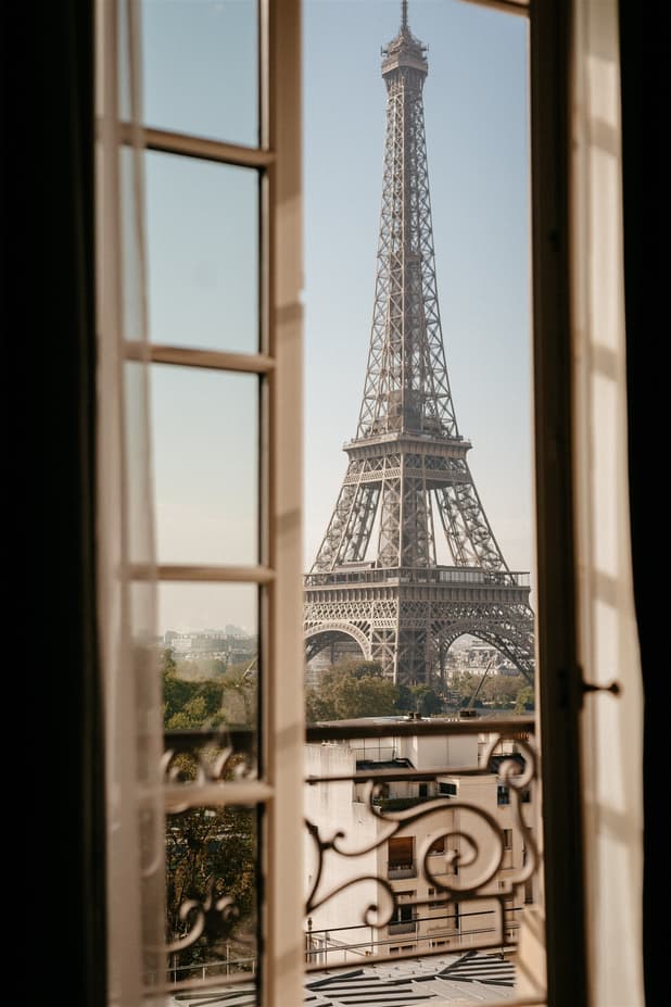 Eiffel tower through the window shangri-la hotel paris blue sky wedding