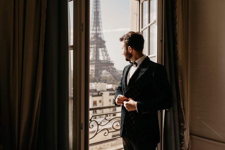 paris shangrila intimate wedding photographer groom looking at eiffel tower