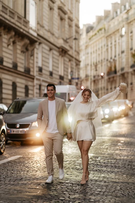 paris wedding photographer couple walking on the street