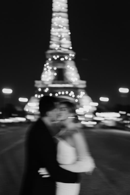 Eiffel tower blinking couple photoshoot paris at night with fashion couple engagement