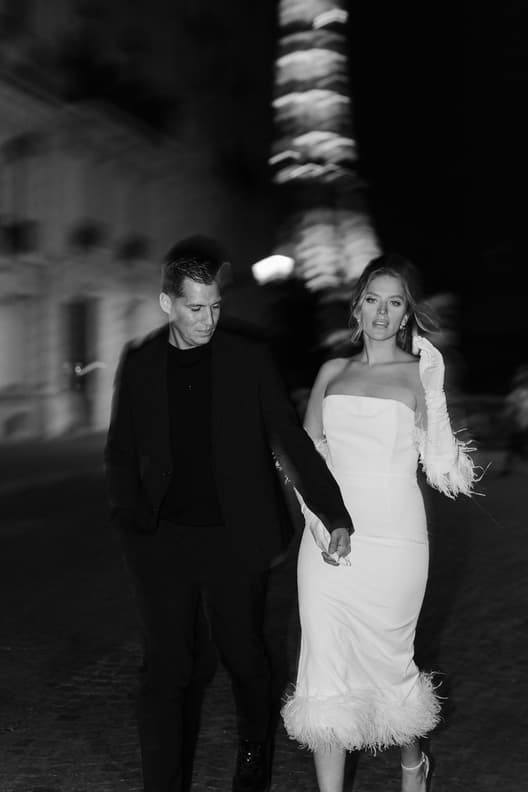 Eiffel tower backdrop couple photoshoot paris at night with high fashion couple engagement