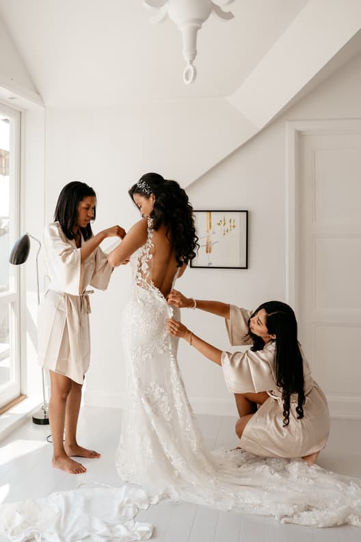 Bride wedding preparations with bridesmaids