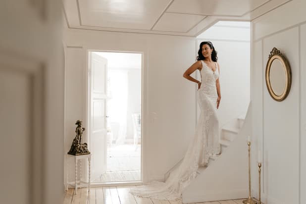 Bridal poses on staircase with white backdrop