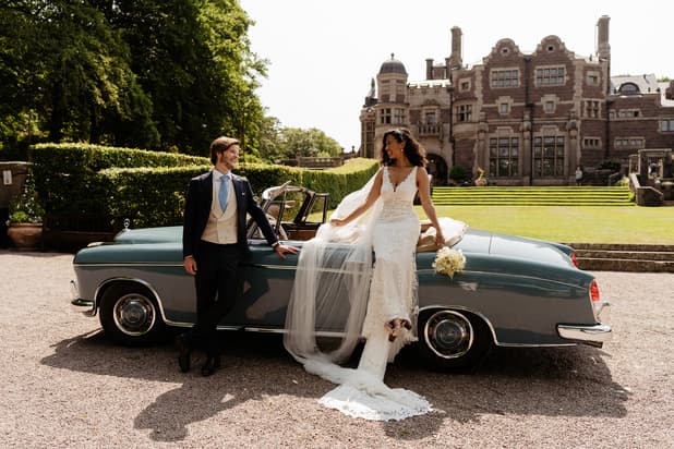 Stunning views of Couples Wedding Portrait shots in a castle gardens with vintage car