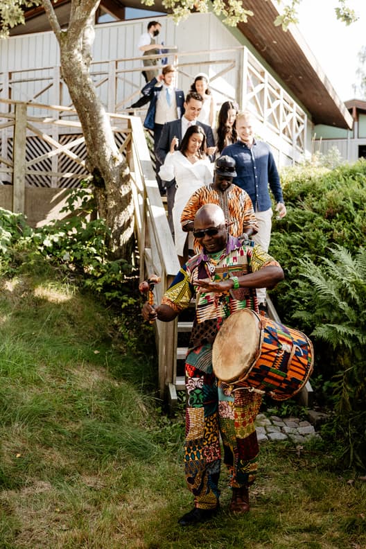 Bride & groom entrance dinner reception fun and with traditional band