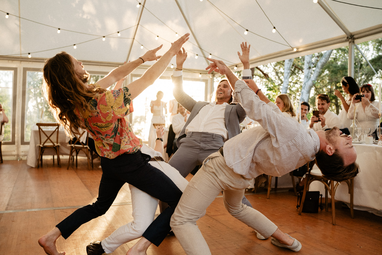 Funny Groomsmen dancing in wedding reception