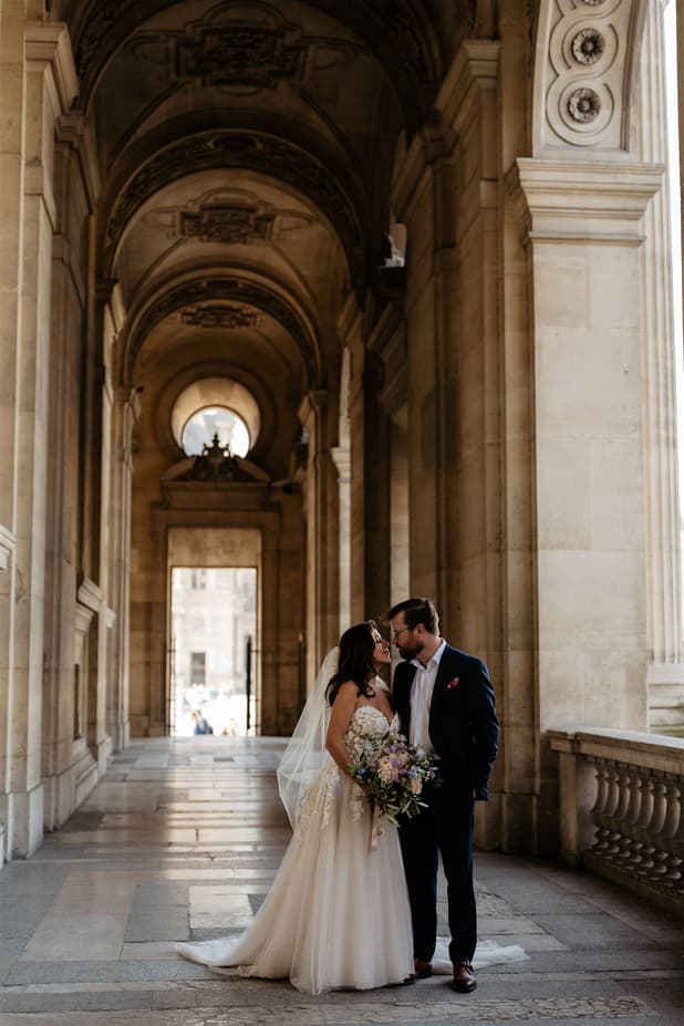 Romantic couple photoshoot elopement Louvre Secret Passage