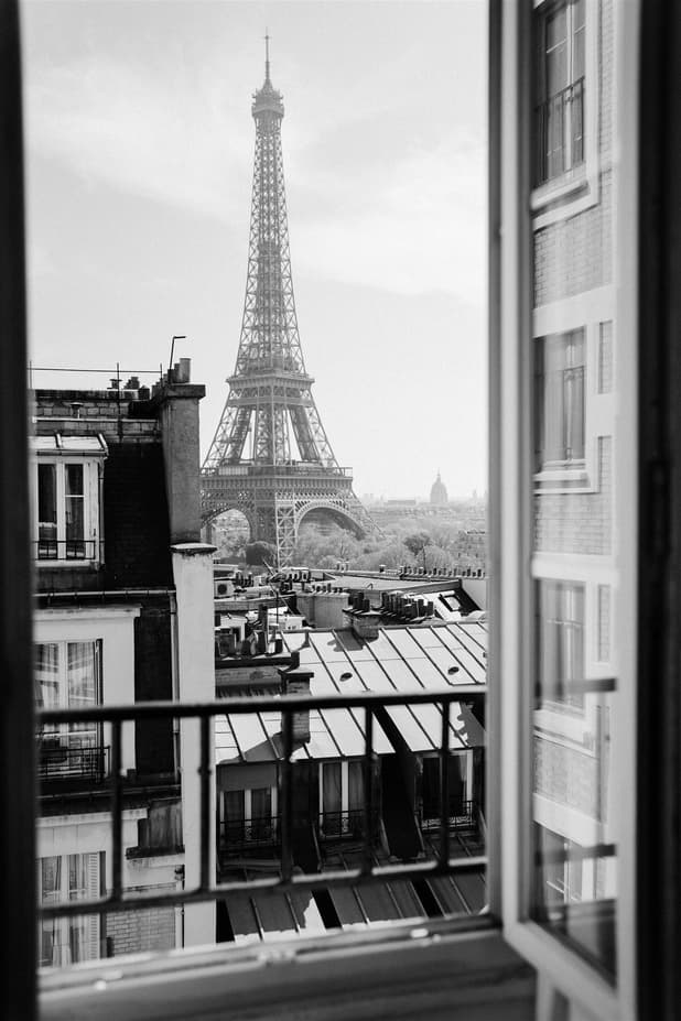 black an white Eiffel Tower from window view