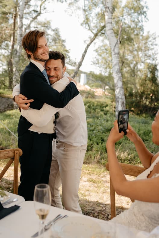 Groom and groomsmen candid intimate moments 