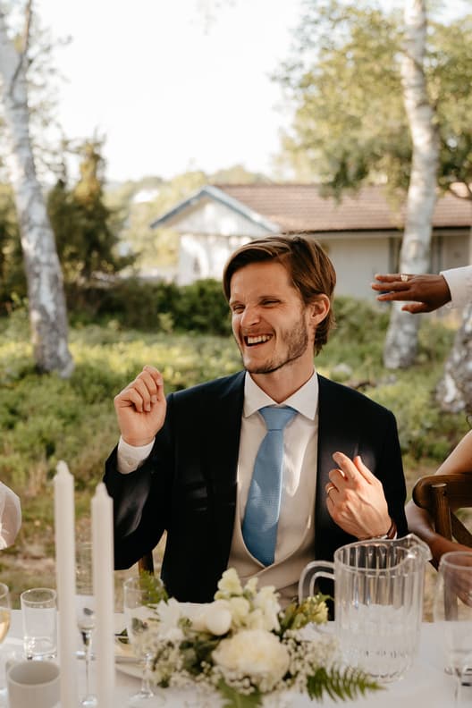 Groom Celebrating Happy Wedding Reception Candid Moments