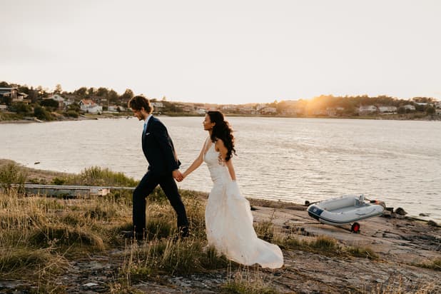 Sunset wedding photoshoot with scenic views in meadow