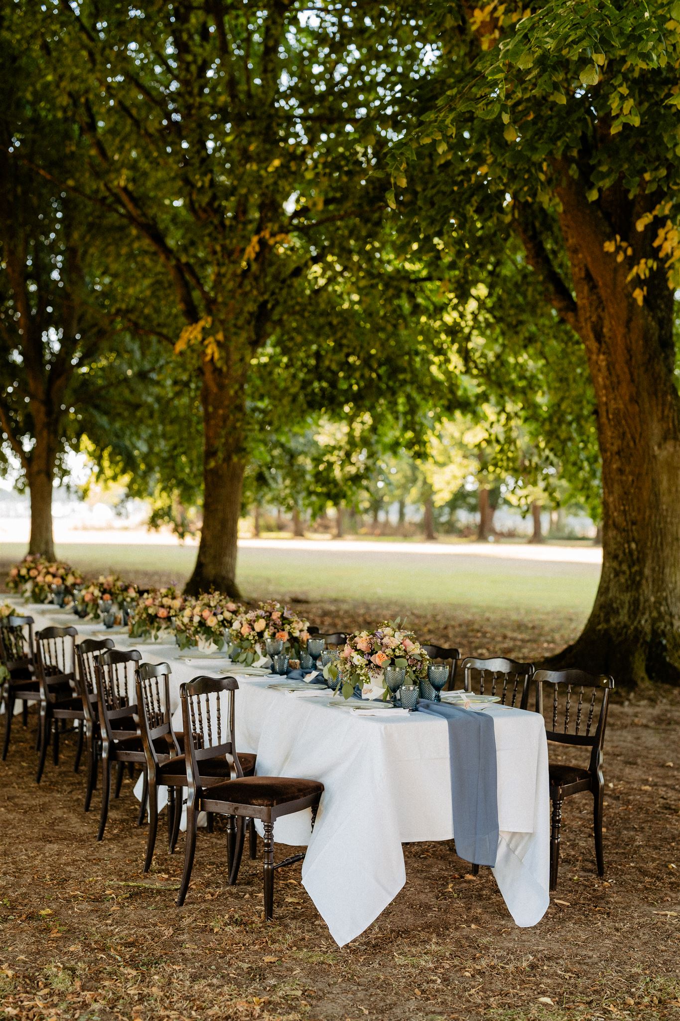 Outdoors dinner reception decor of Chateau wedding