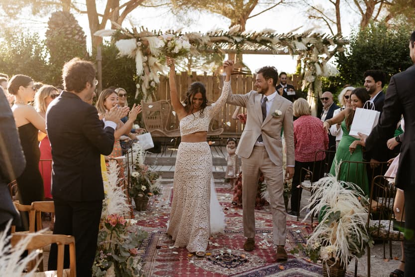 Saint Tropez Bohemien Inspired Wedding Exit with Petal toss