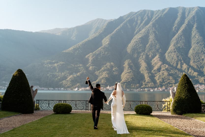 Villa Balbiano elopement wedding destination couple popping champagne Italy destination wedding photographer videographer