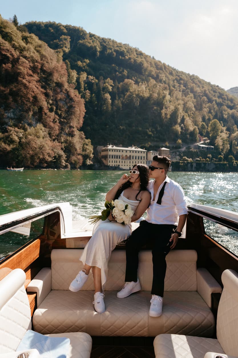 Elopement wedding Lake Como boat ride couple photoshoot Italy destination wedding photographer videographer